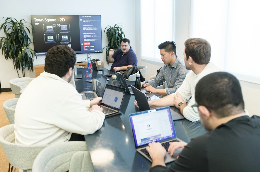 group of programmers collaborating