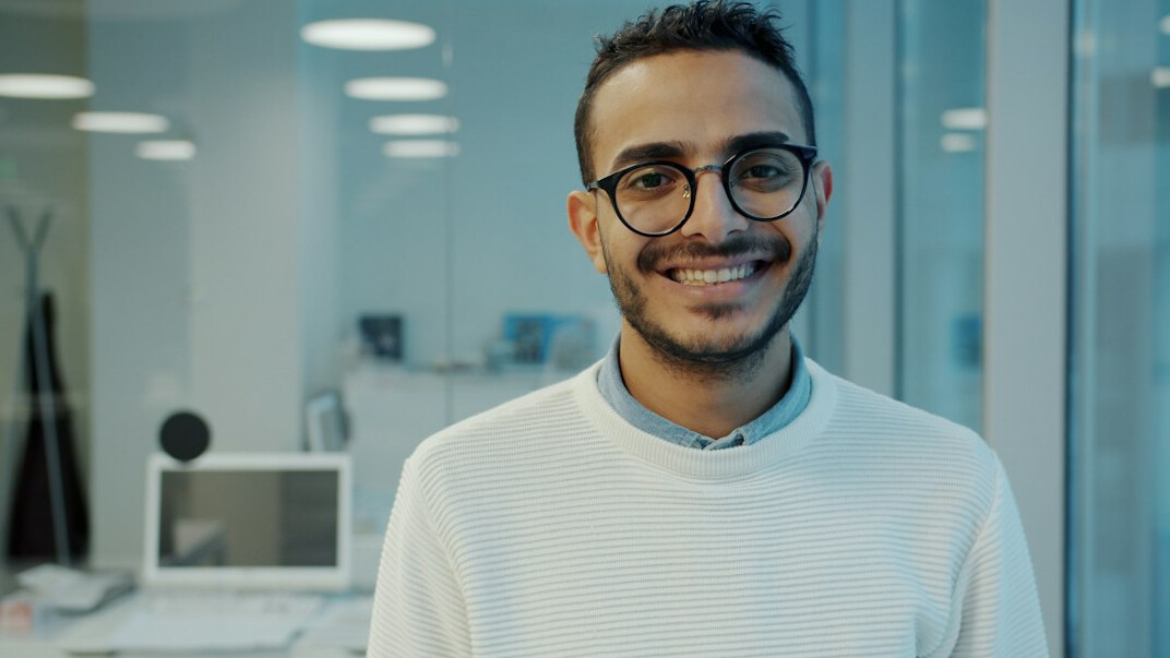 successful programmer smiling